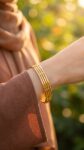 Use_the_gold_bangle_bracelet_202606281555