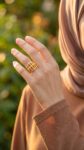 Use_the_multi-layered_gold_ring_202606301359 (1)
