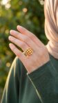 Use_the_multi-layered_gold_ring_202606301359 (1)